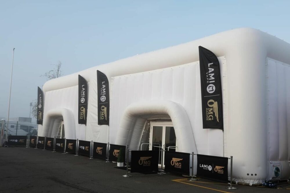 Side view of the white, 20m inflatable cube at the 2023 British Superbike (BSB) Championship