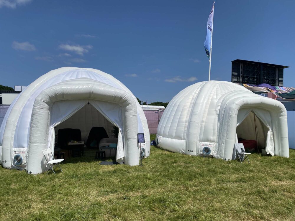 Two Evolution Dome 6m Domes outside at the Epsom Derby